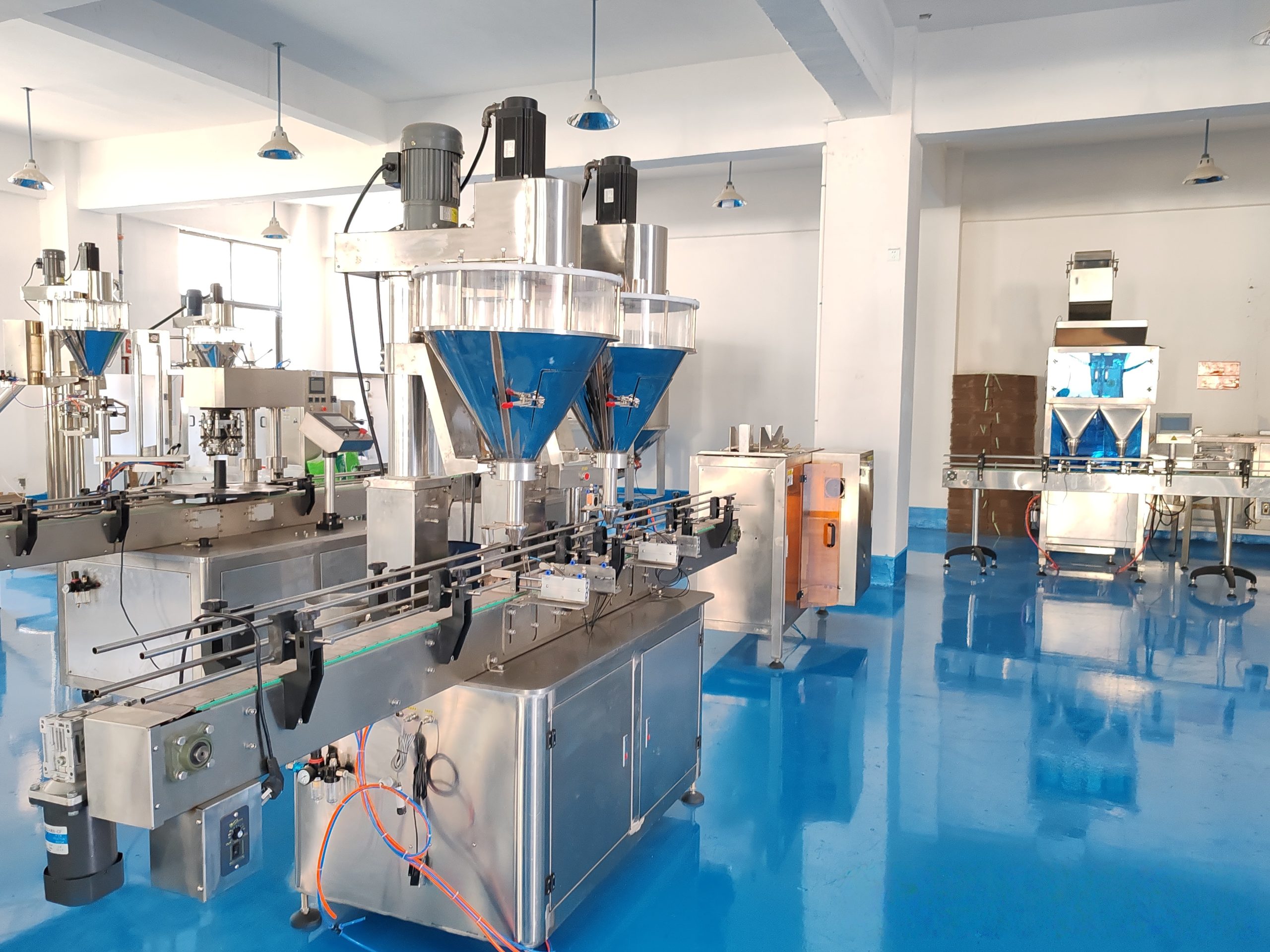 Automated liquid and powder filling and assembly line