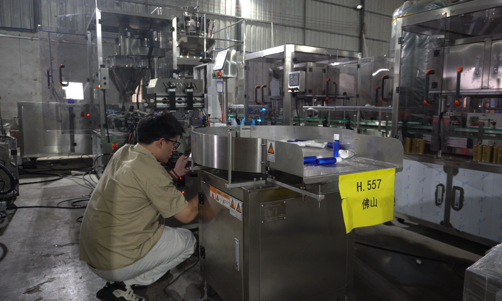 Automated toothpowder filling line for oval bottles